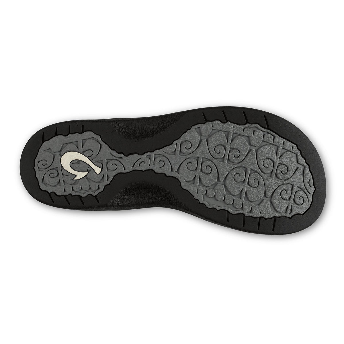 Black and gray shoe sole with ornamental scrollwork pattern and white logo detail.