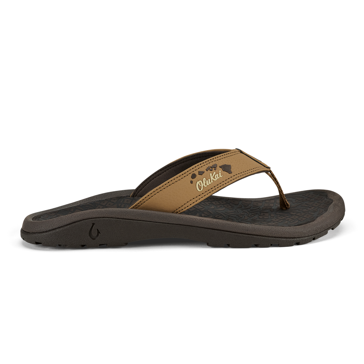 Tan leather thong sandal with black sole and island chain design detail on strap.