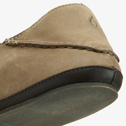 Clay and dark java colored slipper with layered suede and leather upper, dark sole, and decorative stitching detail.
