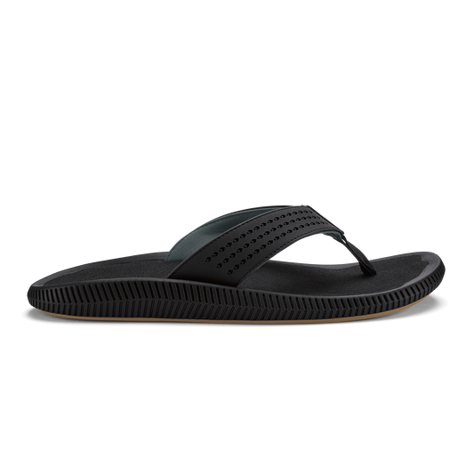 Black thong sandal with perforated upper strap and textured sole.