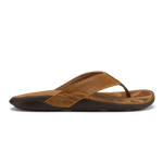 Tan leather flip-flop with black sole and embossed leaf pattern on footbed.