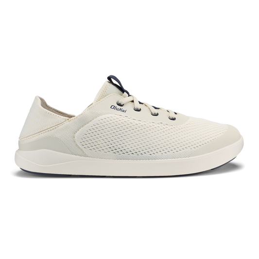 White mesh lace-up sneaker with navy blue accents and white sole, shown in profile view.