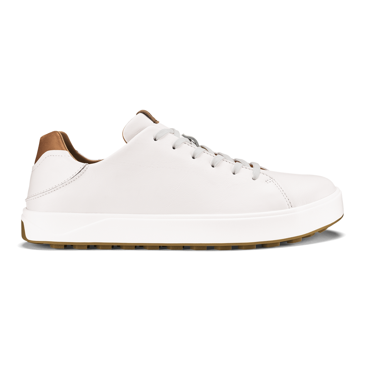 White leather low-top sneaker with tan heel tab and white laces on white sole.