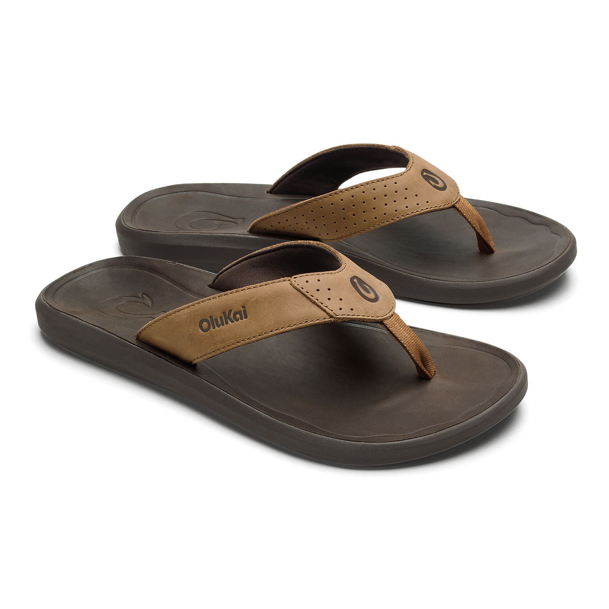 Two tan and dark brown thong sandals with perforated straps and cushioned soles, shown from a three-quarter angle.