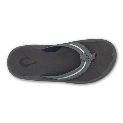 Grey thong sandal with dark navy strap, white trim detail, and adjustable buckle closure, viewed from above.