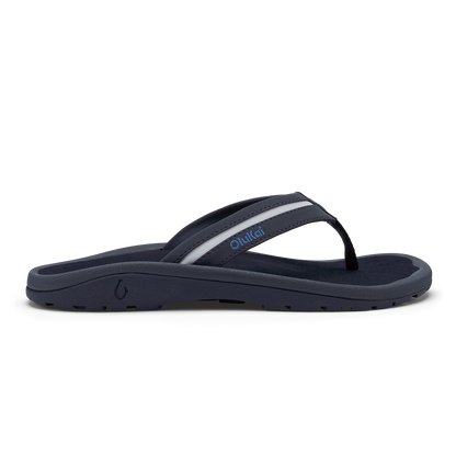 Navy blue sandal with white sole on a white background