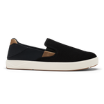 Black slip-on sneaker with tan heel panel and cream rubber sole.