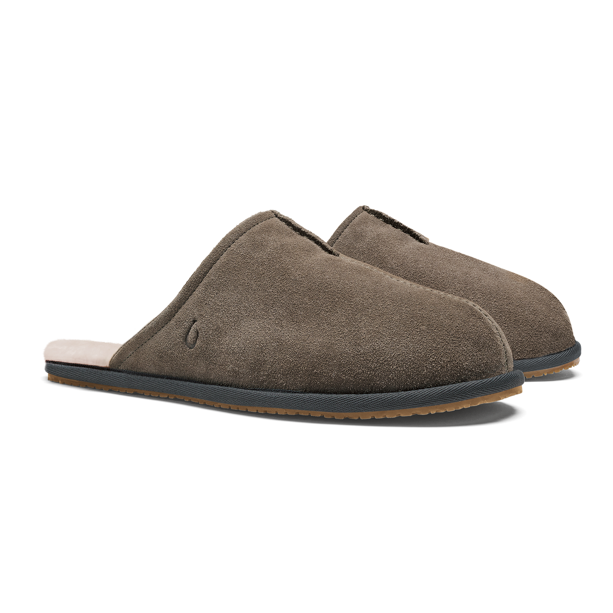 Pair of gray suede slip-on slippers with dark sole and cream-colored heel lining.