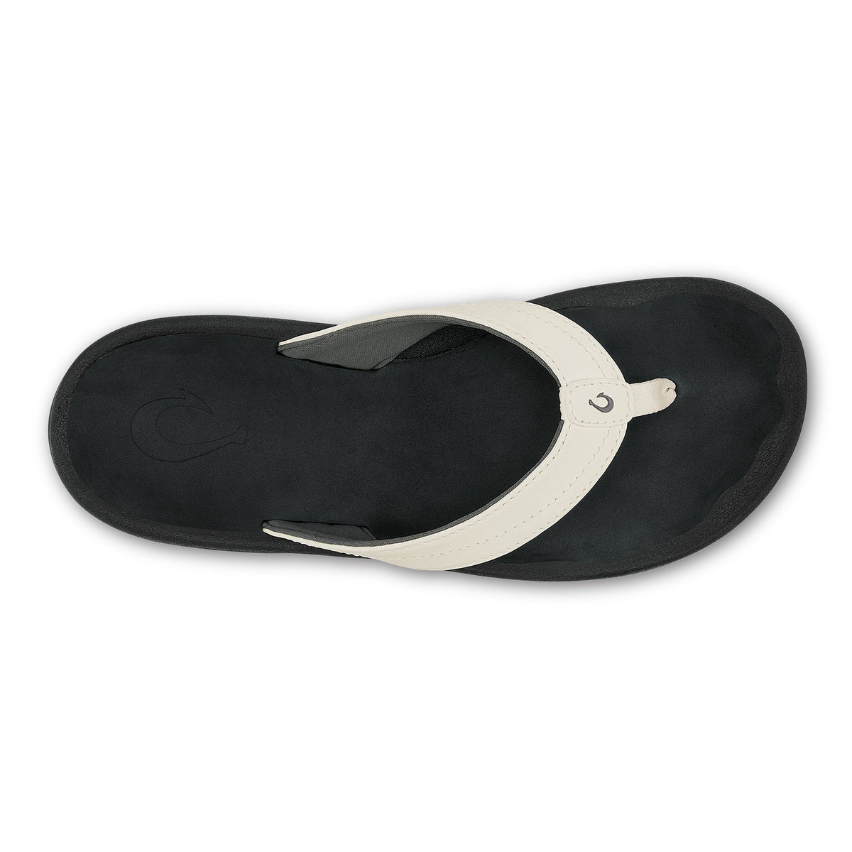 Black and white thong sandal with white strap across black sole, shown from above.