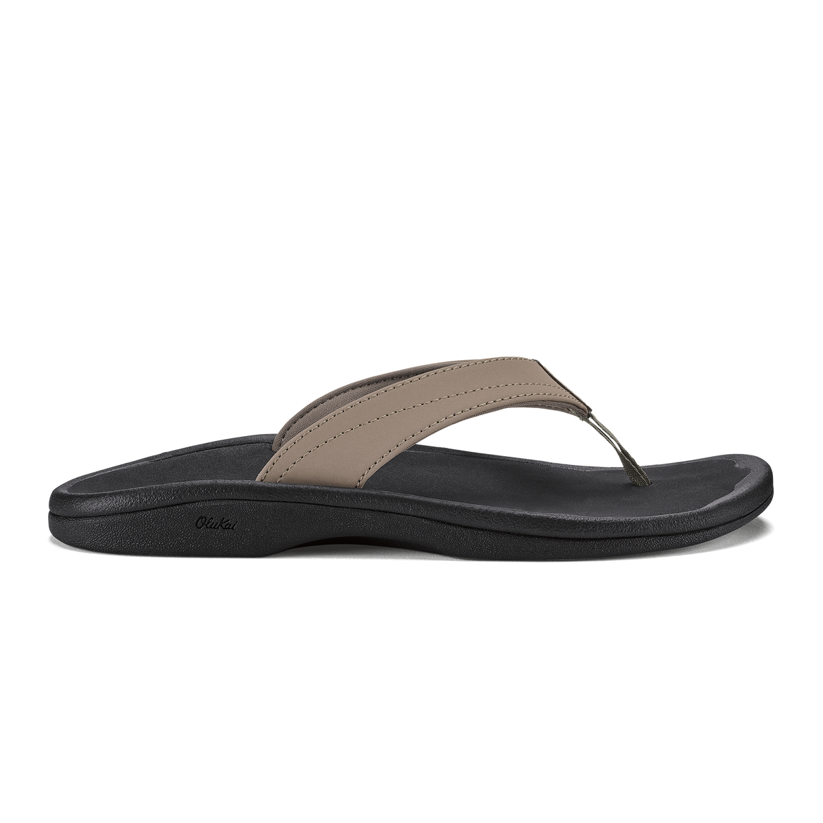 Warm taupe and black thong sandal with curved black sole and stitched toe strap.