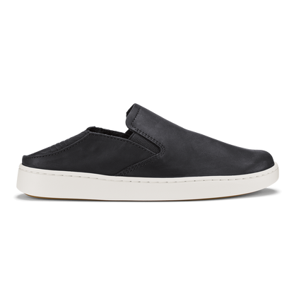 Black leather slip-on shoe with white sole and elastic back panel.