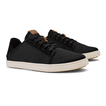 Black knit sneaker with tan collar and cream rubber sole, lace-up closure.