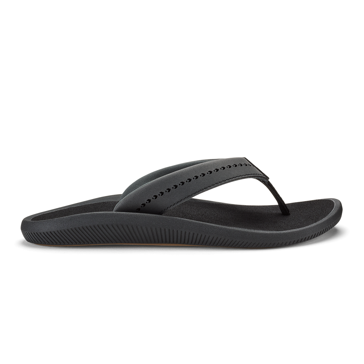 Black thong sandal with ribbed sole and studded upper strap.