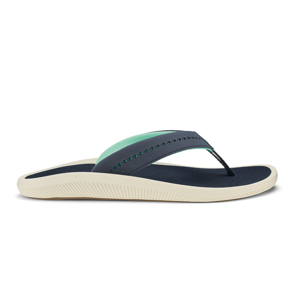 Trench blue thong sandal with mint green strap detail and cream-colored textured sole.