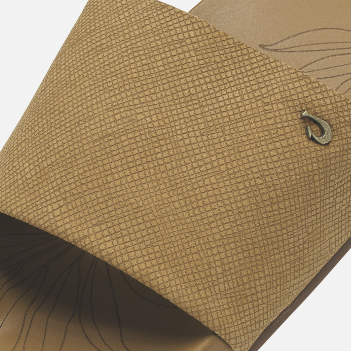 Tan crosshatch-textured sandal with dark brown sole and brand logo detail.