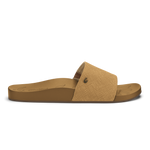 Tan slide sandal with textured crosshatch upper and solid sole featuring decorative line detailing.