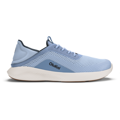 Light blue mesh running shoe with white midsole, dark blue heel counter, and Olukai branding on the side.