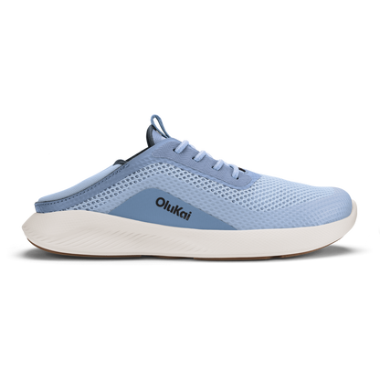 Light blue mesh Olukai athletic shoe with white sole and dark blue heel panel.