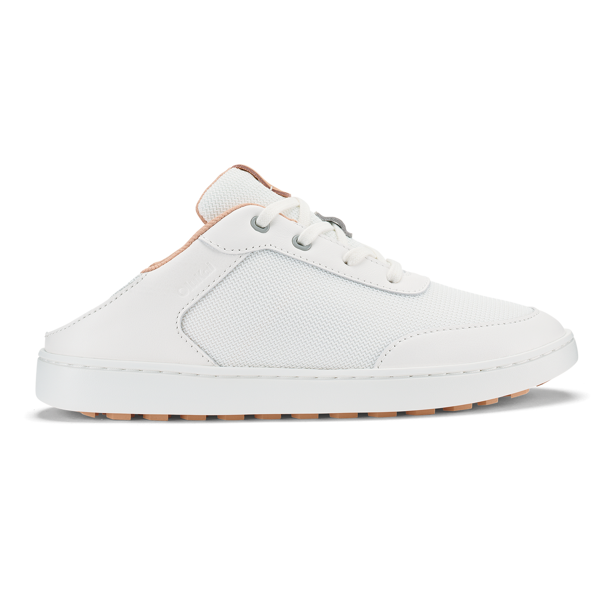 White slip-on sneaker with cantalope-colored heel collar and sole trim.