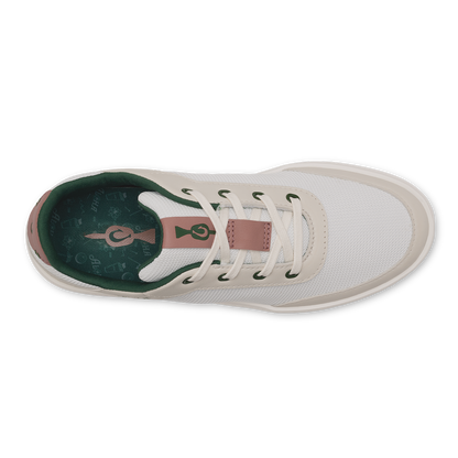 White canvas sneaker with white laces, mauve heel tab, and green insole visible from top view.