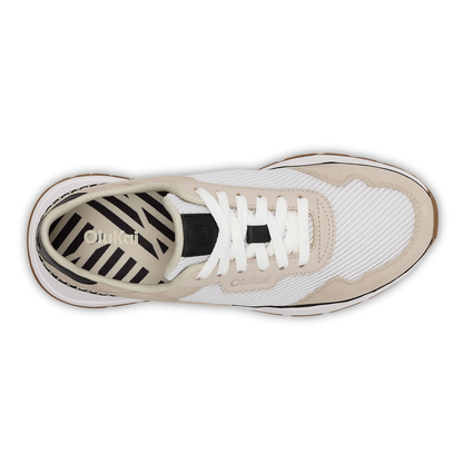High-top sneaker in bright white and ecru with white laces, shown from above with striped interior lining visible.