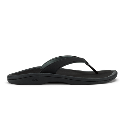 Black thong sandal with curved sole and thin strap across foot.