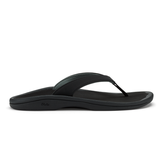 Black thong sandal with curved sole and thin strap across foot.
