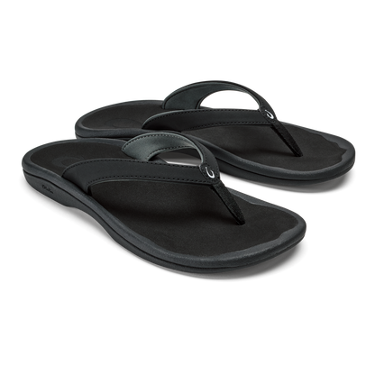 Pair of black thong sandals with cushioned soles and dark straps against white background.